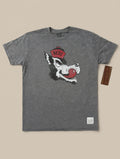 Gray t-shirt with a wolf graphic and 'NC State' logo on a beige background