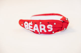 Red beaded headband with 'BEARS' text on a white background