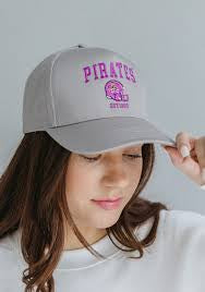 Person wearing a gray cap with 'Pirates' and 'Est. 1796' text, holding it up.