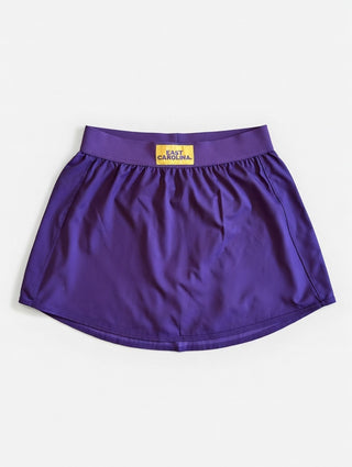Purple athletic skirt with built in spandex shorts with 'East Carolina' label on a white background