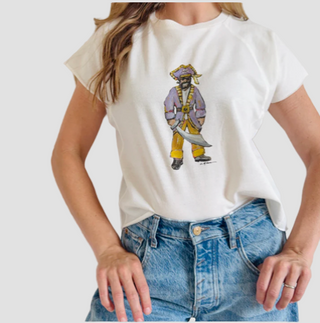 Person wearing a white t-shirt with a watercolor pirate with blue jeans.