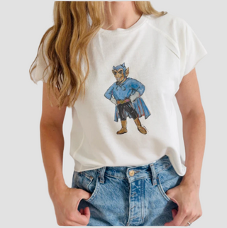 Person wearing a white t-shirt with a water color blue devil design on a plain background