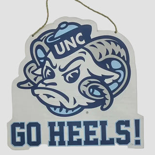 Decorative door sign with UNC logo and 'GO HEELS!' text on a white background