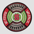 Circular logo with NC State Wolfpack serving platter on a white background